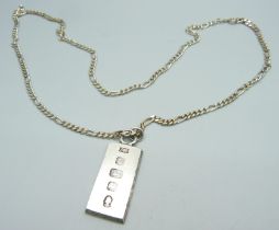 A silver ingot pendant on a silver chain, 39g, chain 59cm