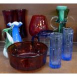 A collection of coloured glass including a hand blown mug, other hand blown pieces, etc. (11)