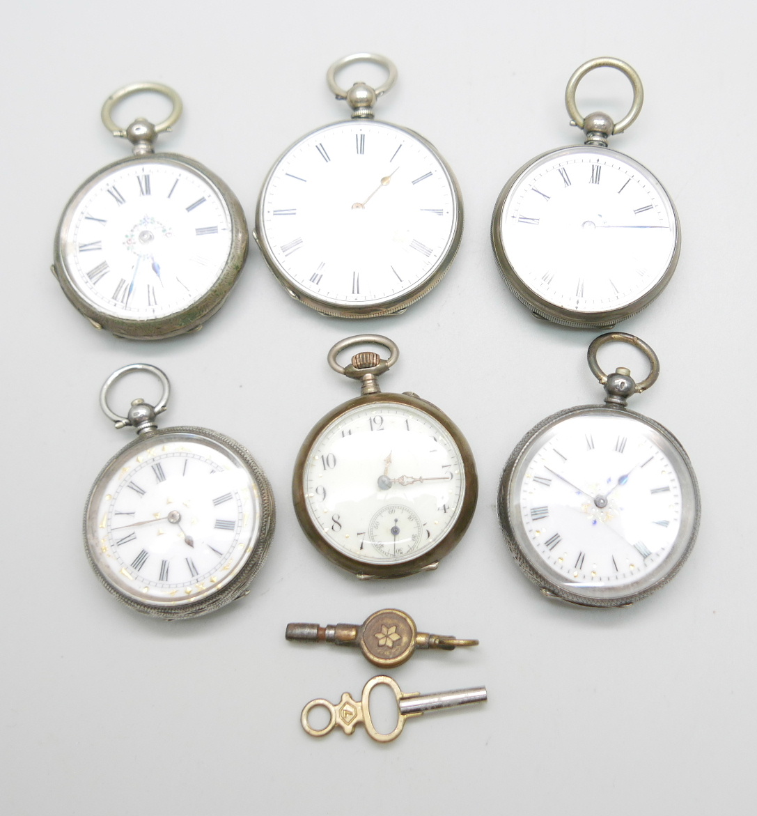 Six ladies Swiss engraved silver fob watches Circa 1910; two winding keys.