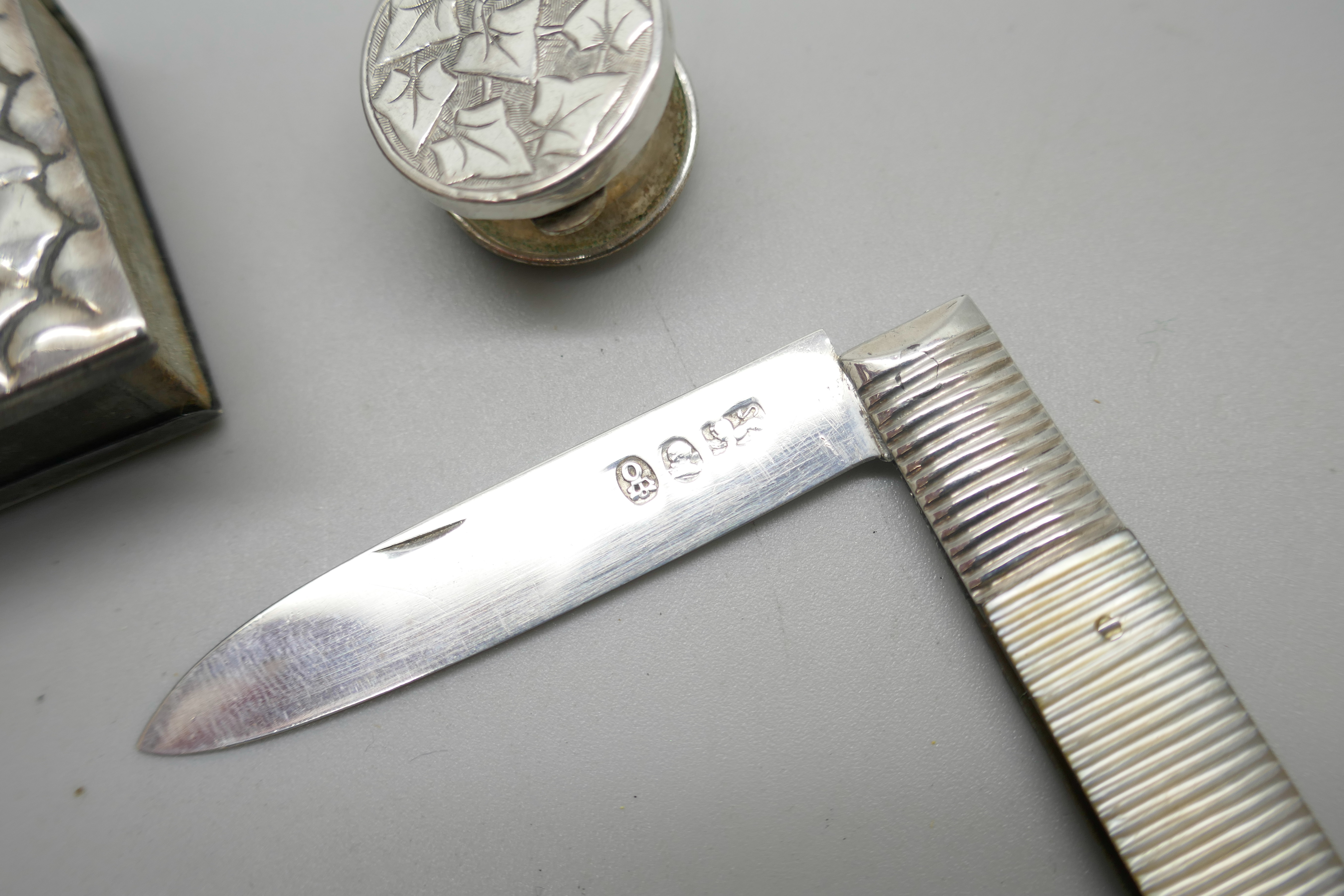 A Georgian silver fruit knife, a small silver matchbox case, a silver pipe smokers knife, etc. - Image 4 of 6