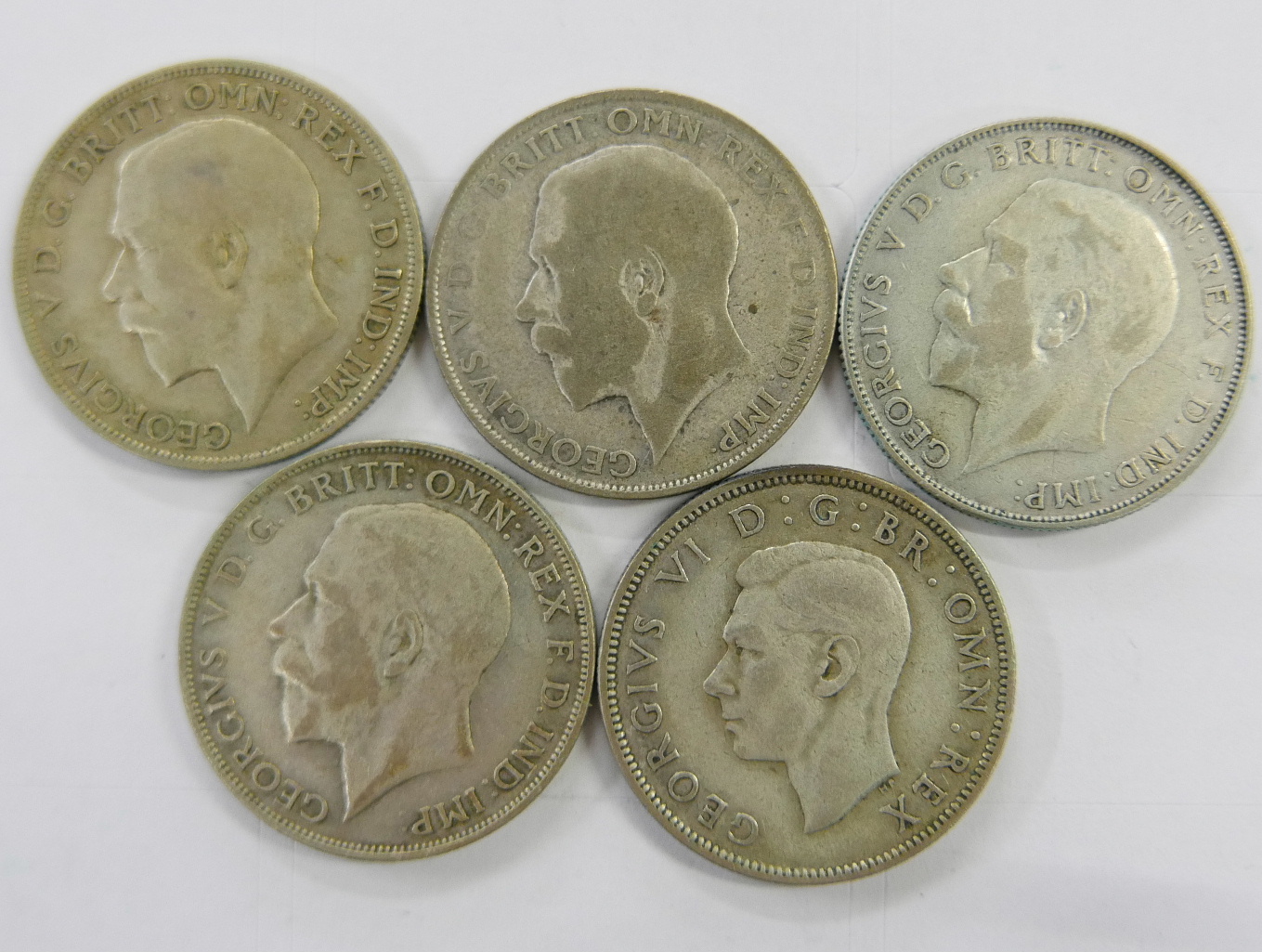 Five florins/two shillings coins, 1921, 1922, 1925, 1926 and 1944