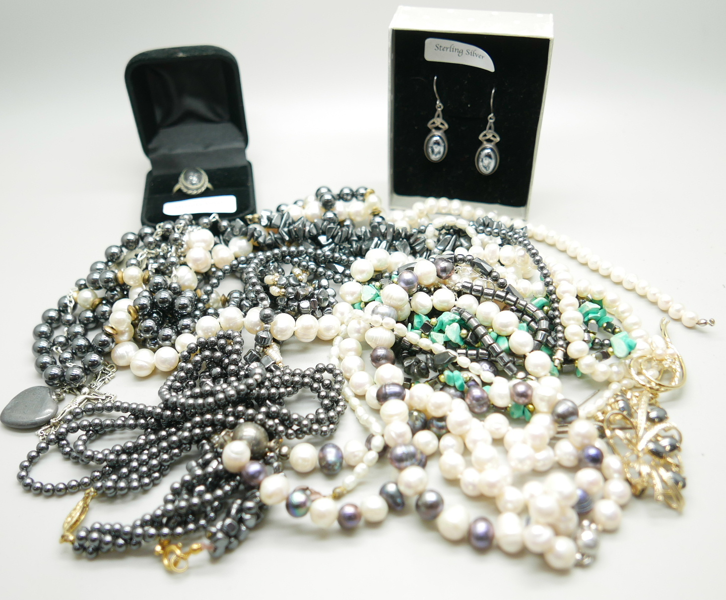 A collection of costume jewellery including pearls