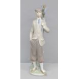 A Lladro figure, Waiting to Tee Off golfer, 1985, boxed