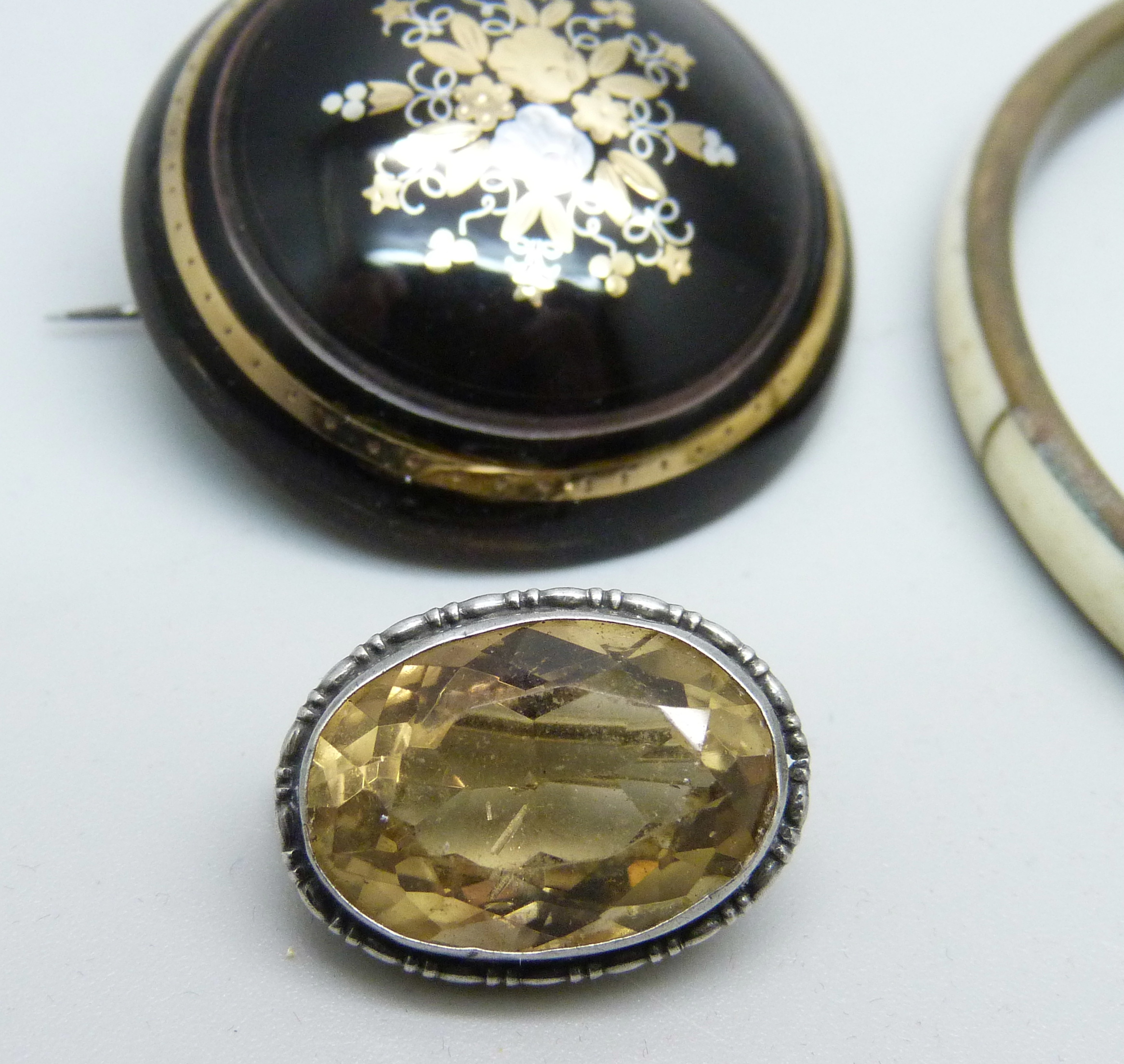 Jewellery comprising a tortoiseshell pique brooch, a pair of red stone earrings, a jet brooch, a - Image 2 of 7