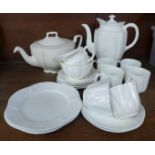 A Royal Crown Derby white four setting coffee set, two Shelley white trios and a white teapot