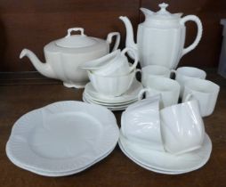 A Royal Crown Derby white four setting coffee set, two Shelley white trios and a white teapot