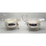 A pair of silver sauce boats, London 1934, marked Harrods, 496g