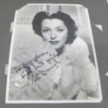 An album of signed celebrity publicity photographs, over 20 signed and facsimile autographs