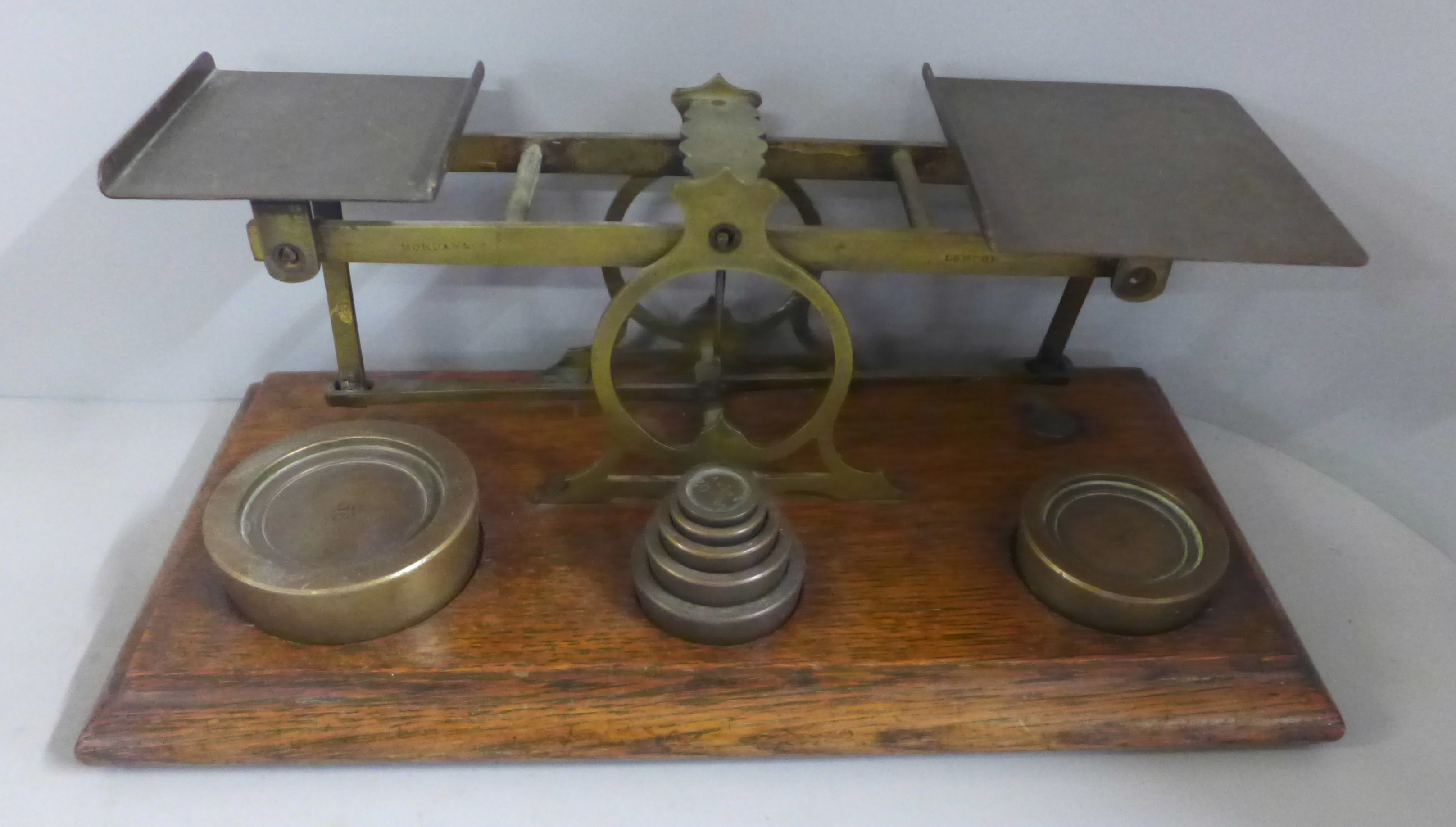 A collection of brass and a novelty couple kissing wine stopper, two sets of postage scales and - Image 2 of 5