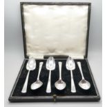 A cased set of six grapefruit spoons, EPNS