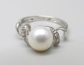 An 18ct white gold, diamond and pearl ring, 2.9g, M/N