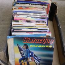 A collection of over 100 7" 45rpm singles including The Beatles, Rolling Stones, Status Quo, some
