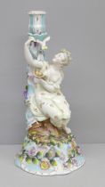 A German porcelain figural candlestick