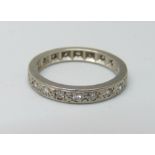 A white metal and diamond eternity ring, 3.4g, L