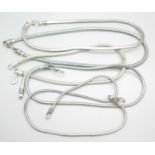 Five white metal neck chains