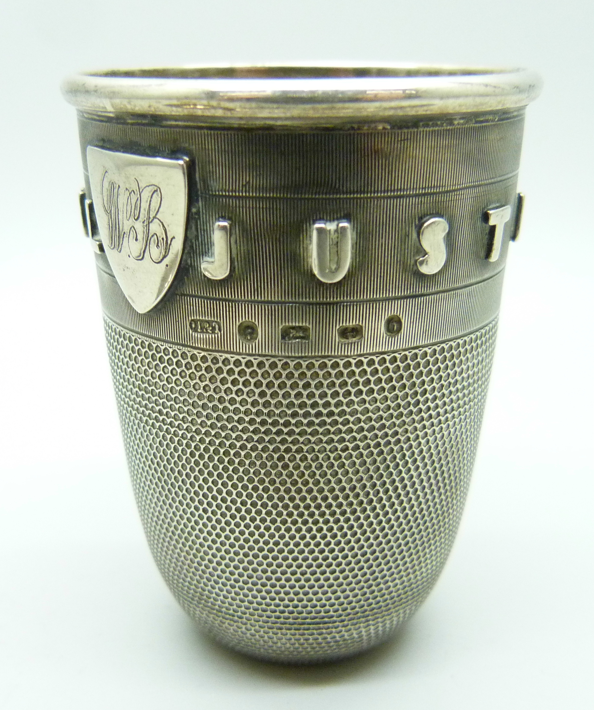 A novelty Victorian silver 'Just a Thimble Full' shot cup with applied shield with initials, - Image 4 of 4