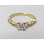 An 18ct gold and diamond ring, 2.6g, M, main stone 0.25ct diamond weight