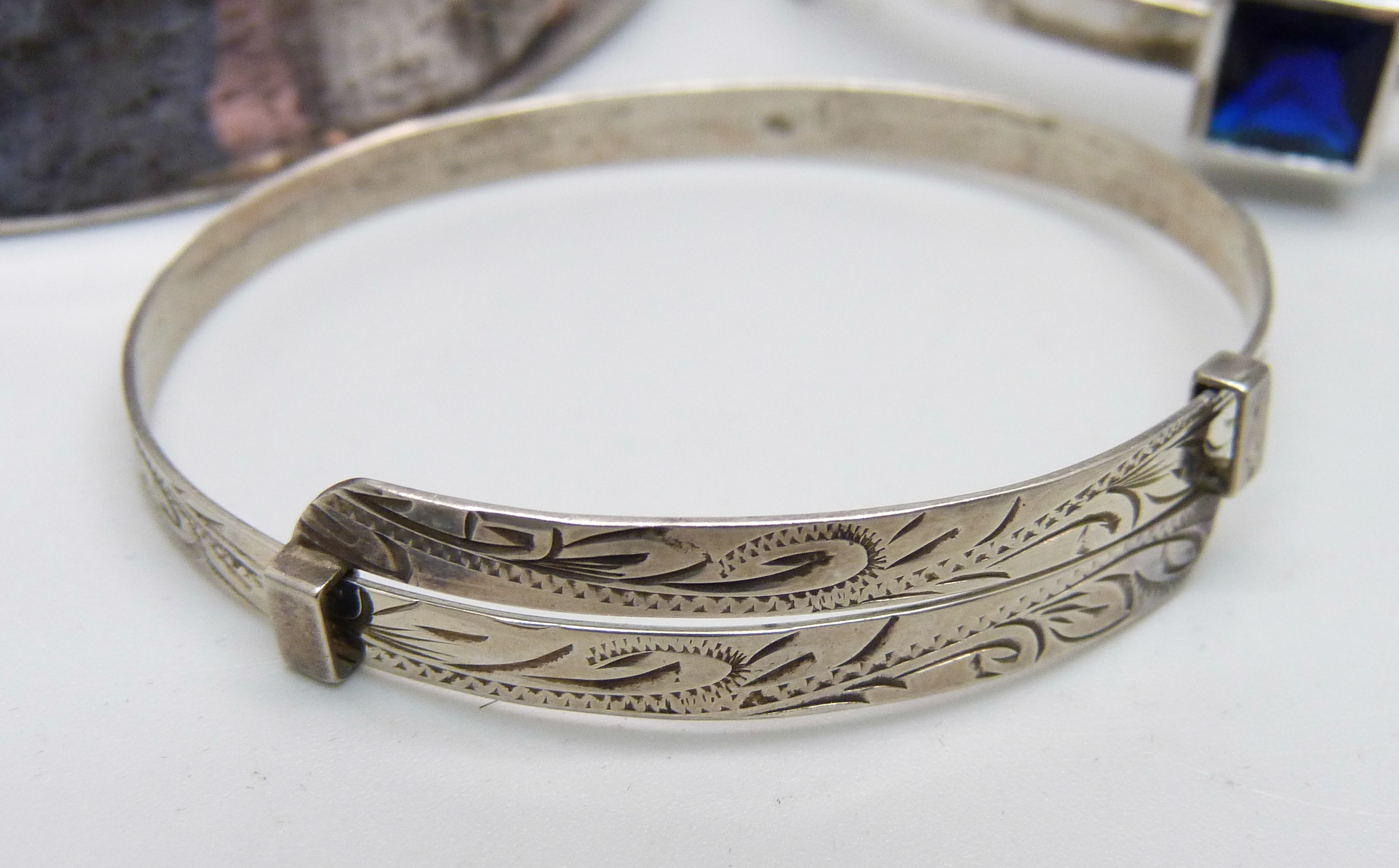 Four silver bangles, 115g, (one smaller size) - Image 4 of 6