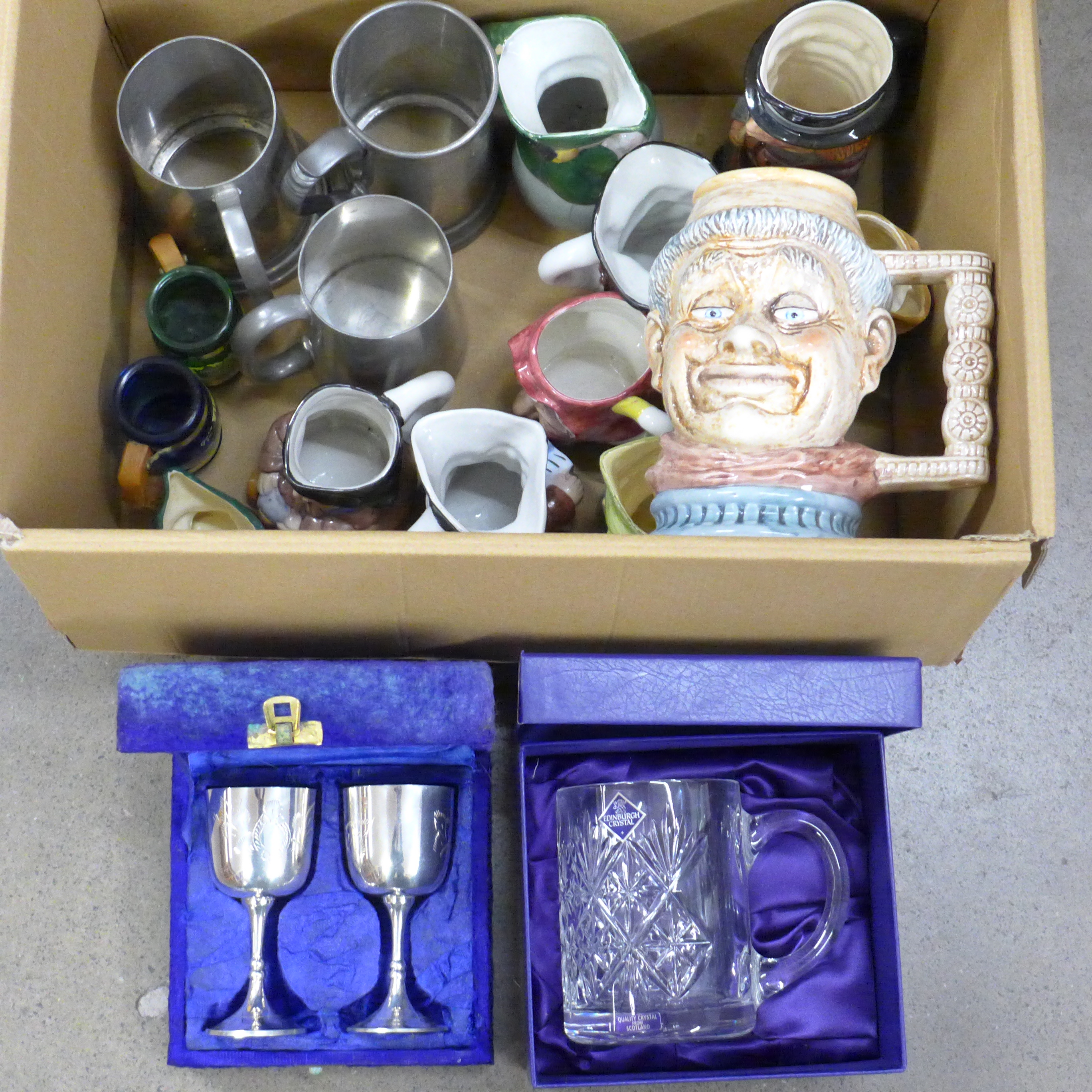 A collection of Toby jugs, one Royal Doulton Toby jug, Edinburgh crystal tankard, boxed, three