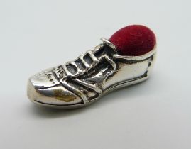 A silver small novelty pin cushion in the form of a football boot, 27mm