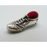 A silver small novelty pin cushion in the form of a football boot, 27mm