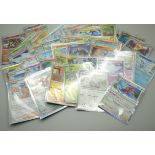 Fifty Holox Rev Holographic Pokemon cards in protective sheets