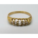 An 18ct gold and five stone diamond ring, 2.5g, M