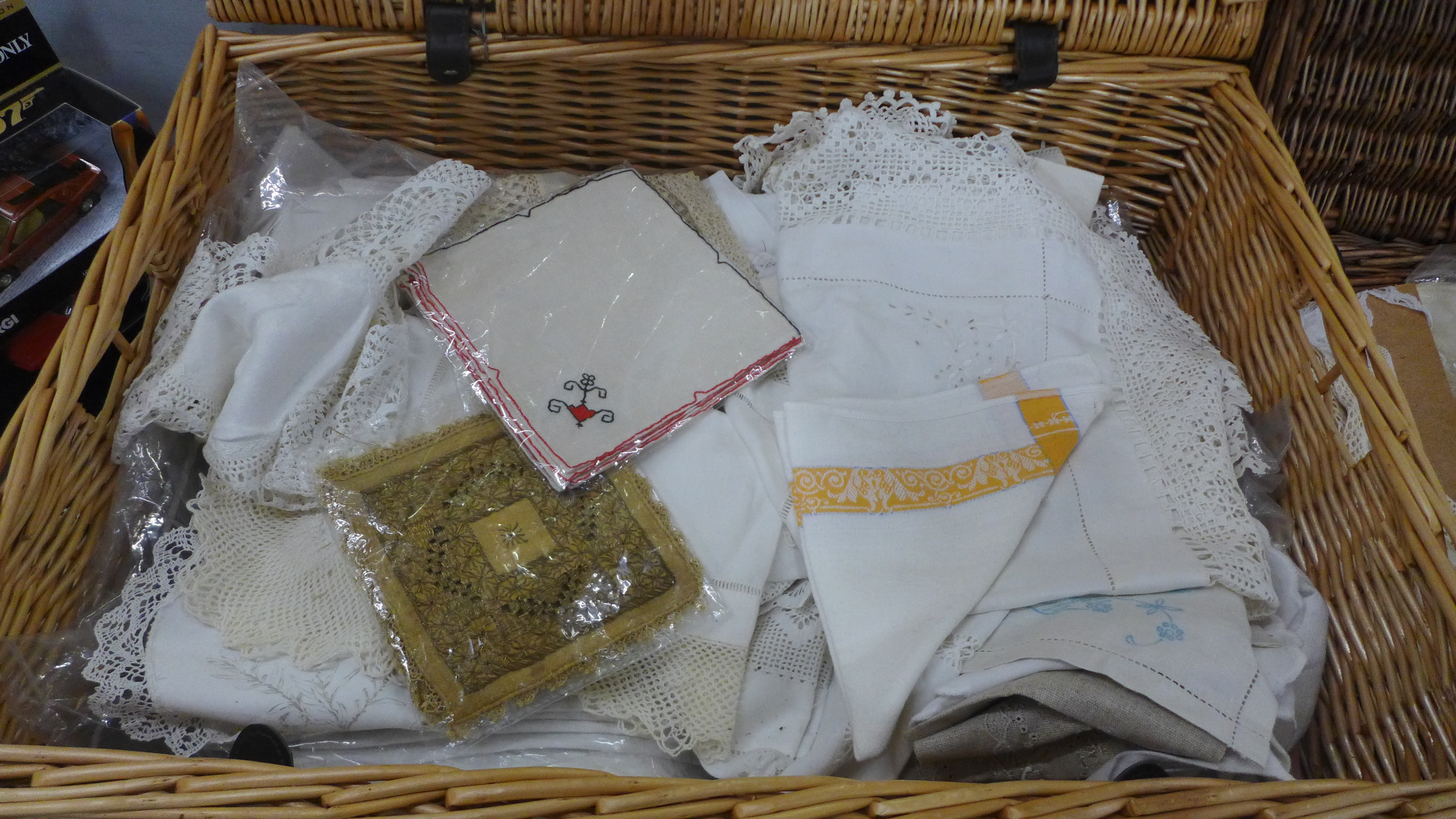 Four wicker baskets, one containing linen, one trims, lace and crochet edge, one haberdashery and - Image 2 of 4