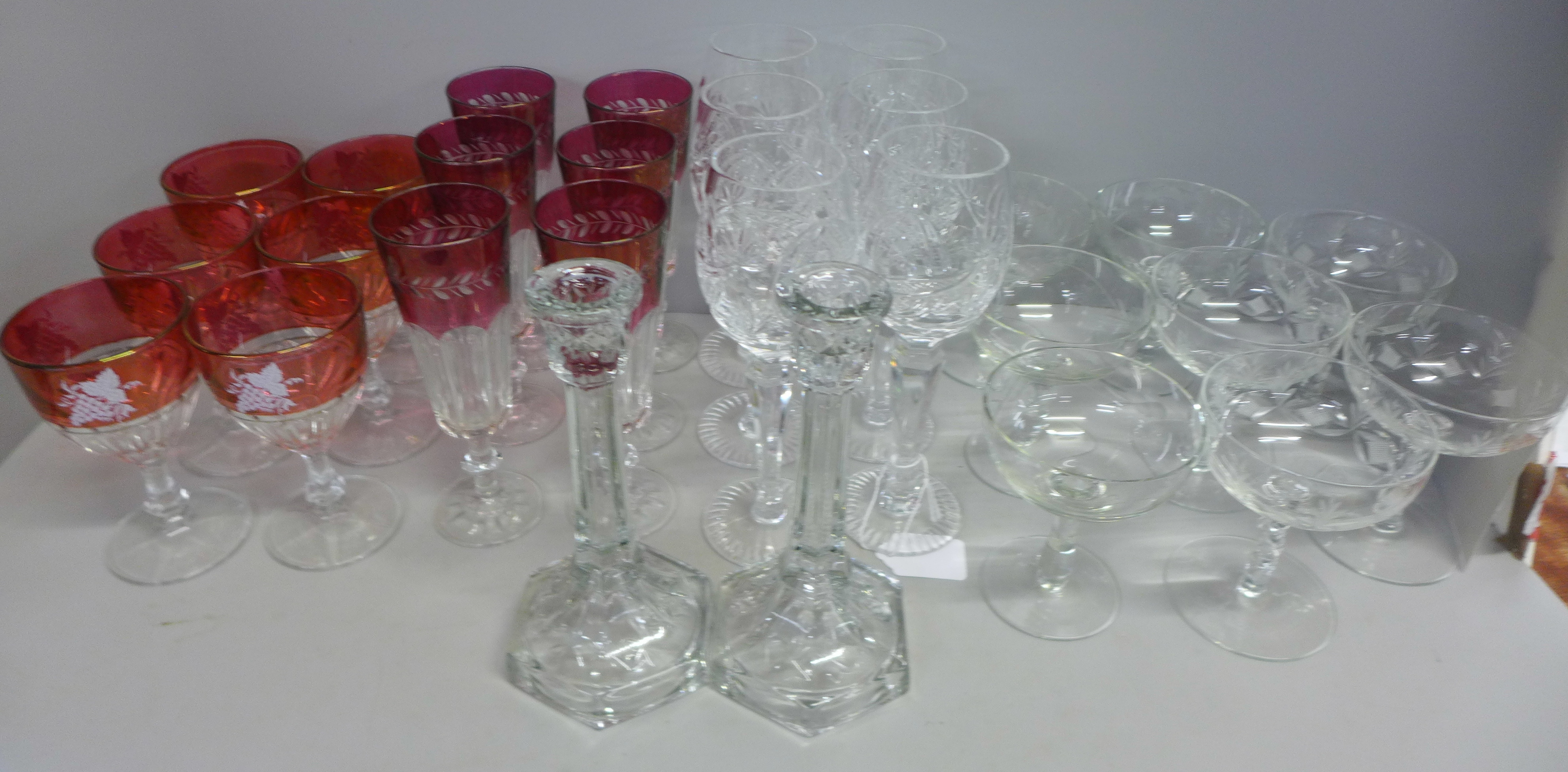 A box of mixed drinking glasses, eight various etched champagne coups, two sets of six ruby flash