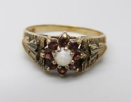 A 9ct gold, opal and garnet cluster ring, 3.3g, R