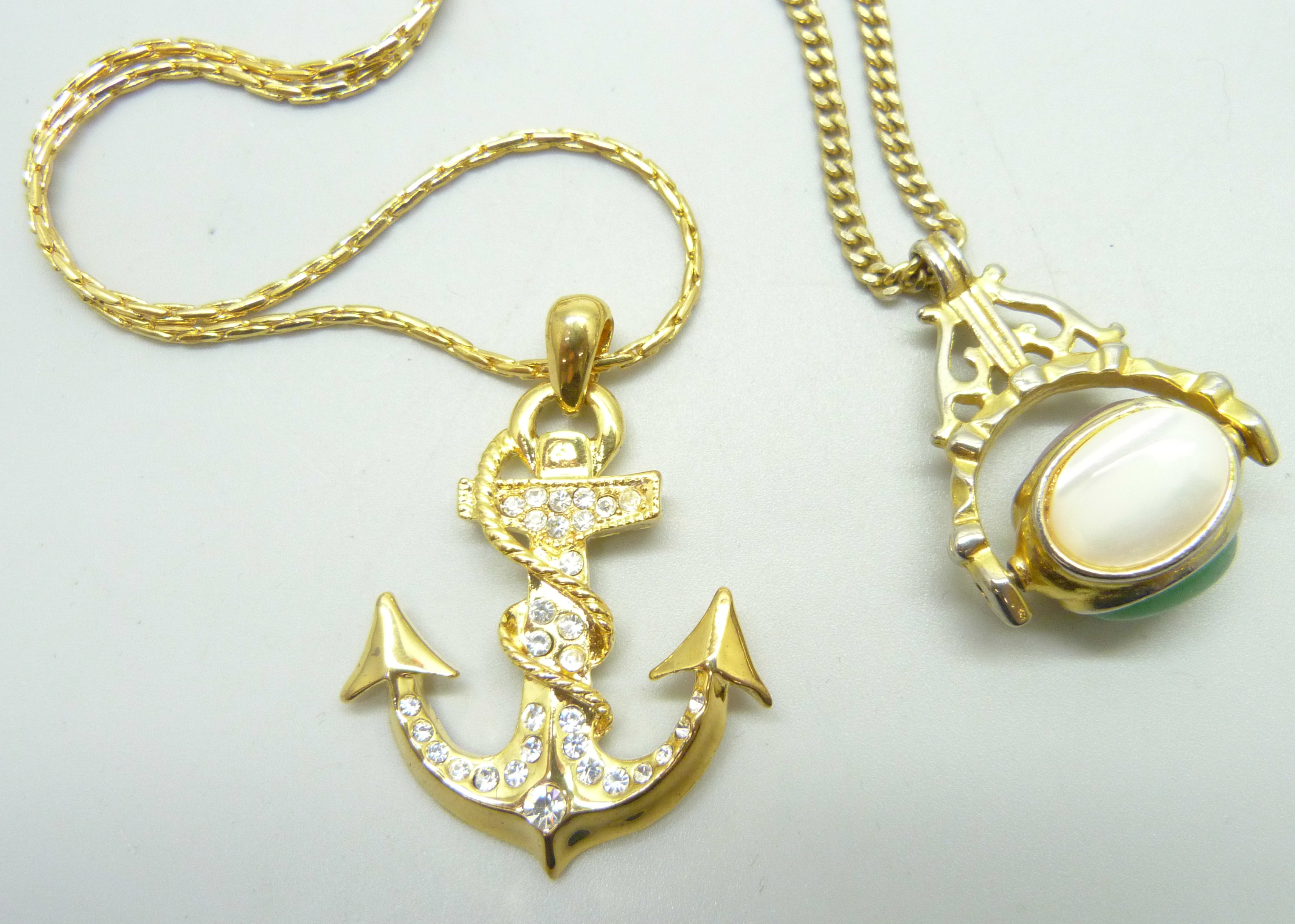 A plated swivel fob pendant on a plated chain and an anchor pendant and chain - Image 2 of 4