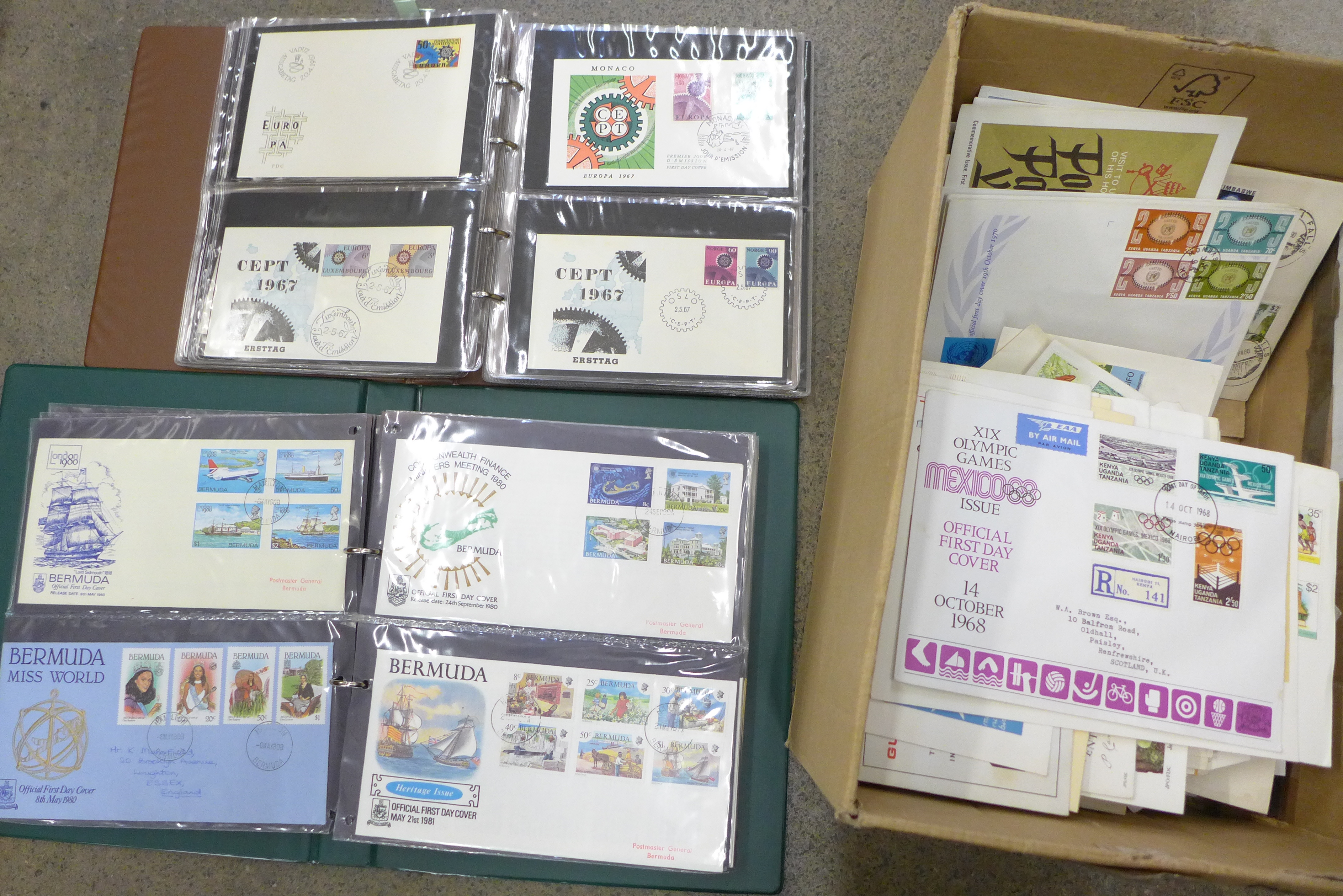A box of stamps, worldwide first day covers in albums and loose