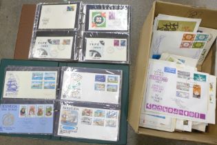 A box of stamps, worldwide first day covers in albums and loose