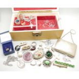 A jewellery box and contents including a silver locket, three chains and ring, and a plated purse