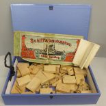 An early 20th Century wooden shipbuilding game and instructions