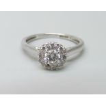 An 18ct white gold and diamond ring, 0.5ct total diamond weight marked on the shank, 2.7g, M,