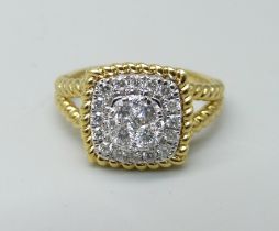 An 18ct gold and diamond cluster ring, 0.5ct weight marked in the shank, 5g, M