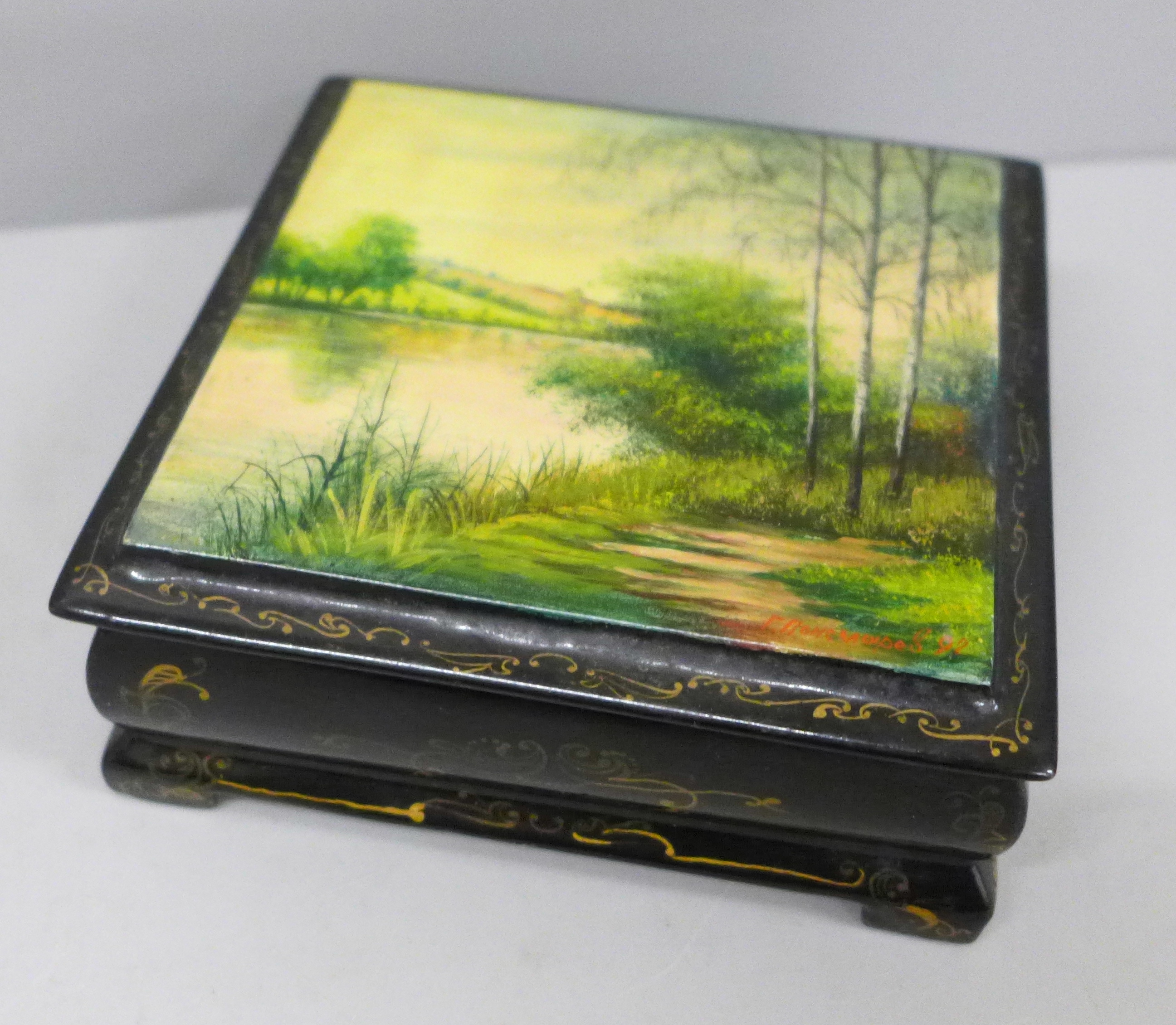 A Russian painted lacquered rectangular trinket box