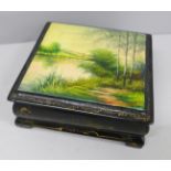 A Russian painted lacquered rectangular trinket box