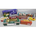 A collection of model vehicles including Corgi 1902 State London set, a Lledo set, Models of