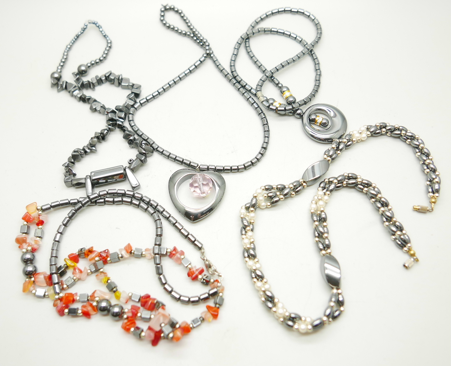 Five hematite and agate necklaces
