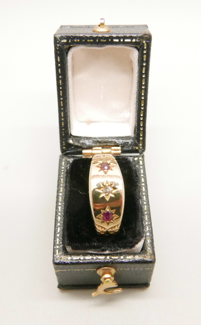 An 18ct gold ruby and diamond ring, 2.8g, O