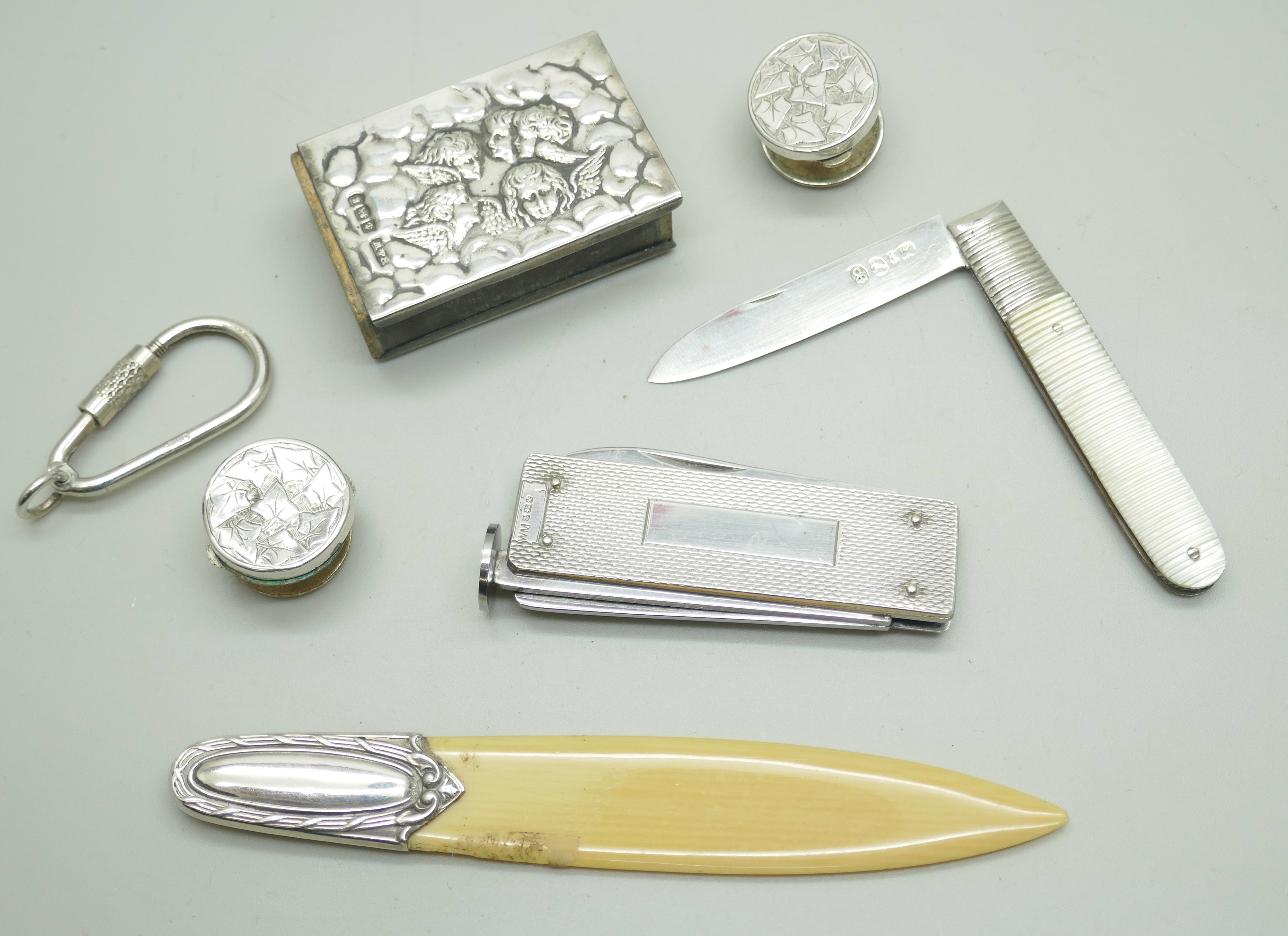 A Georgian silver fruit knife, a small silver matchbox case, a silver pipe smokers knife, etc.