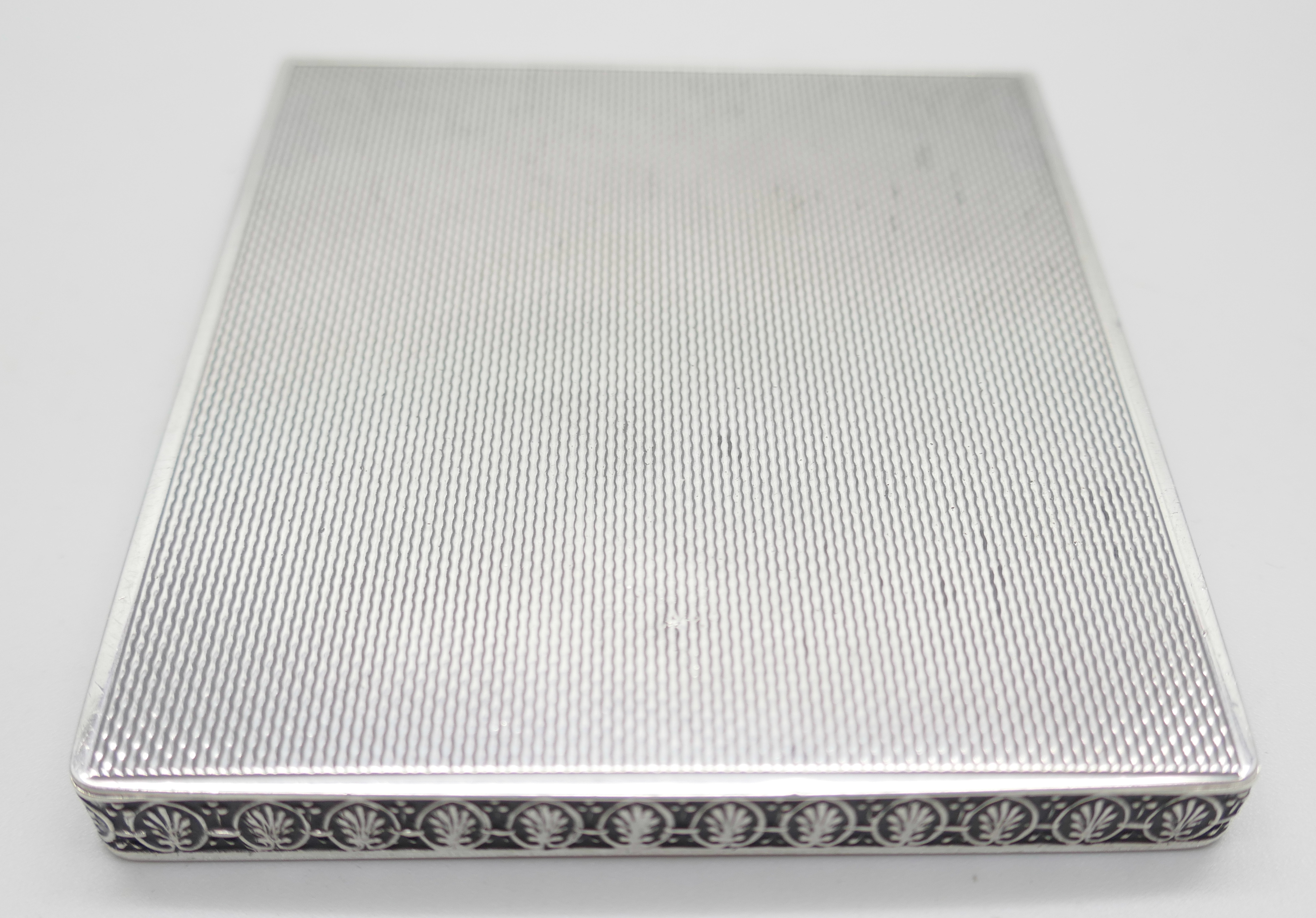 An Art Deco silver case, London 1946, 95g, 71mm x 79mm