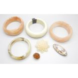 A collection of bakelite and celluloid jewellery