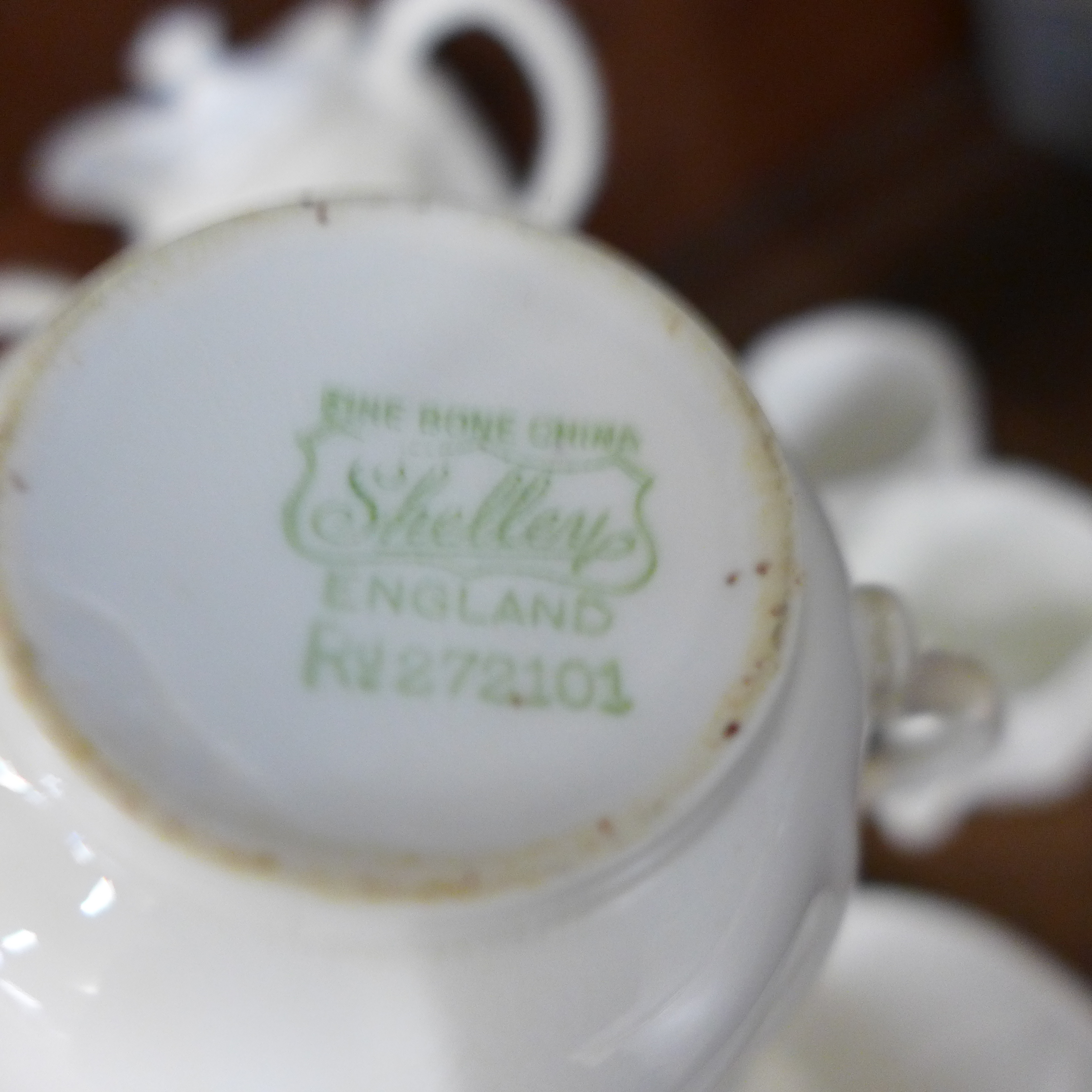 A Royal Crown Derby white four setting coffee set, two Shelley white trios and a white teapot - Image 5 of 6