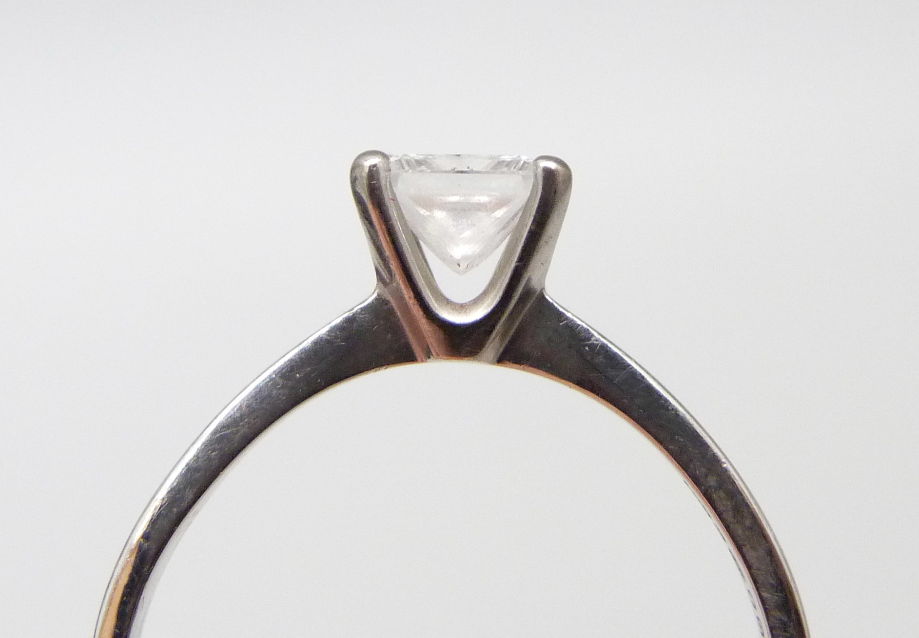 An 18ct gold and diamond ring, square modified brilliant cut diamond, 0.65 carat weight, colour - Image 4 of 6