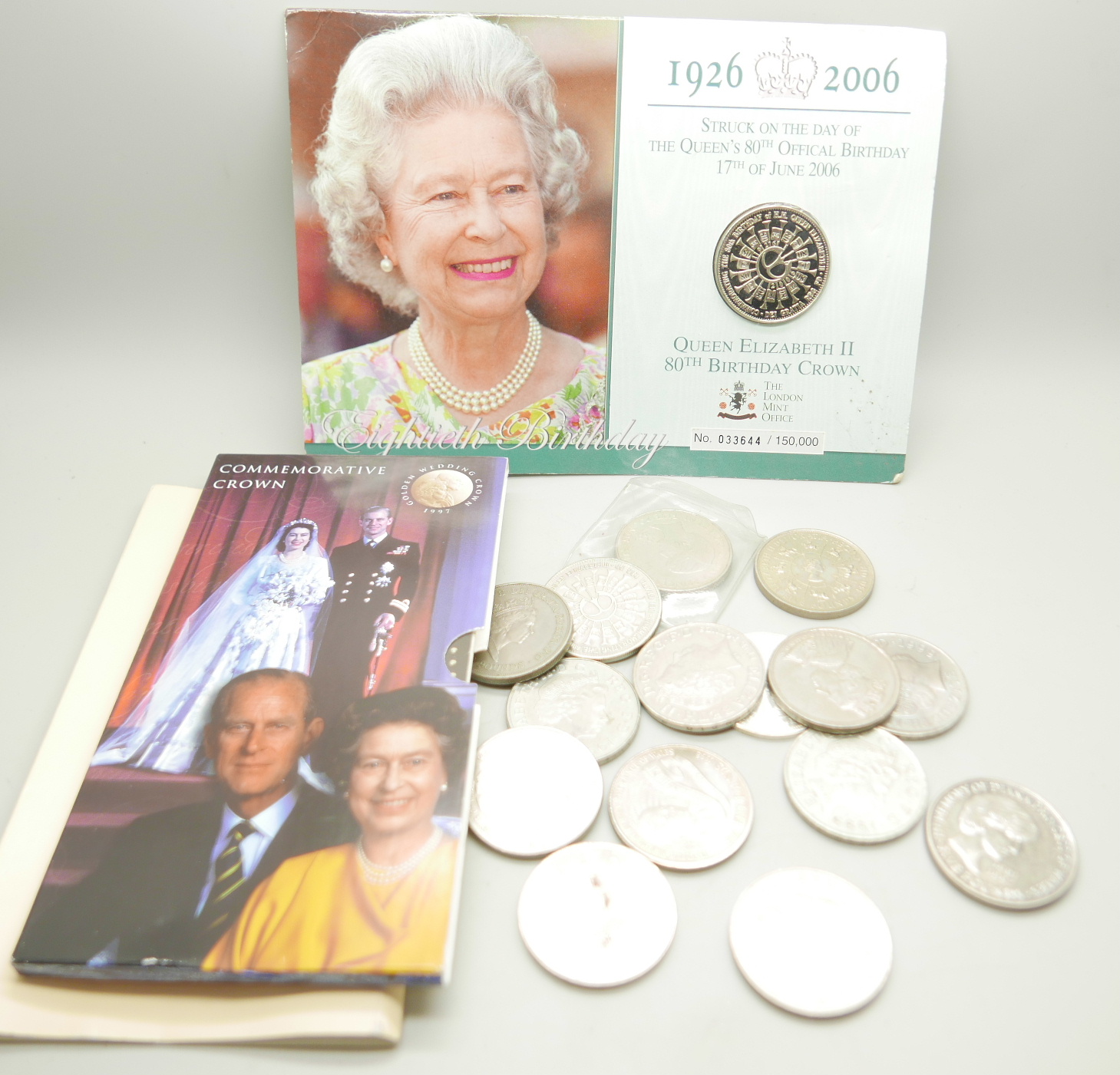 Seventeen commemorative £5 coins