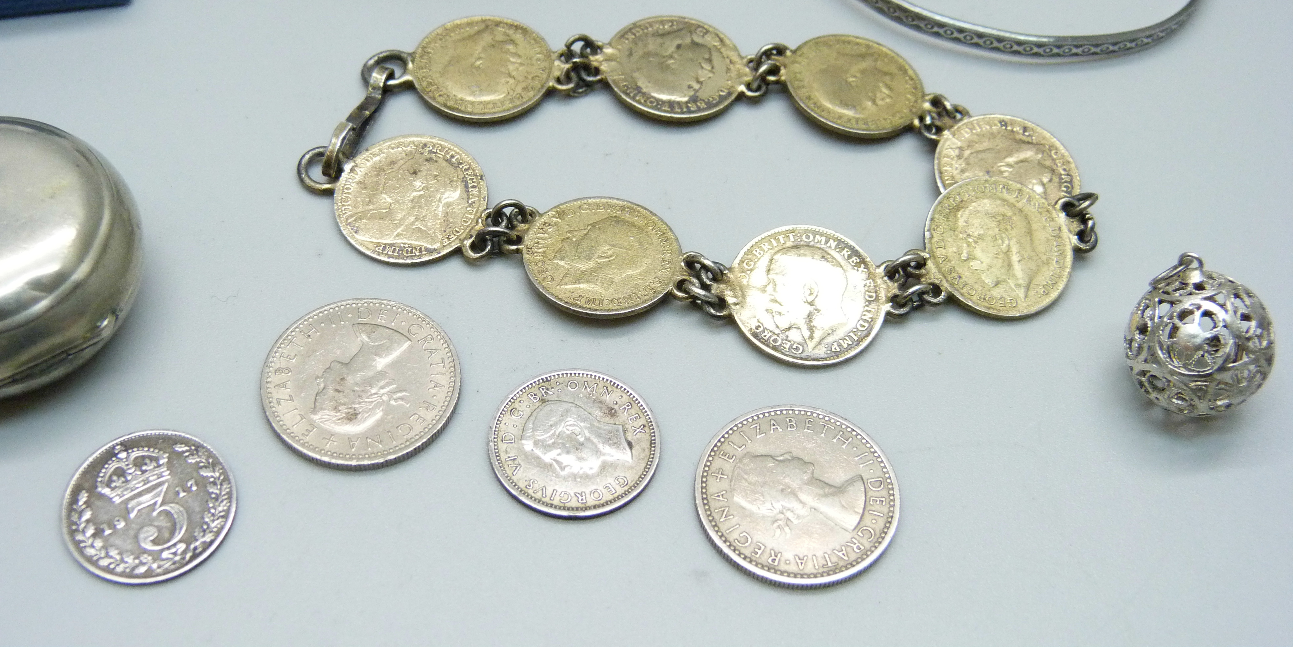Silver jewellery including four silver bangles and a silver charm bracelet, coins and a sovereign - Image 5 of 6