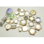 A collection of wristwatch heads